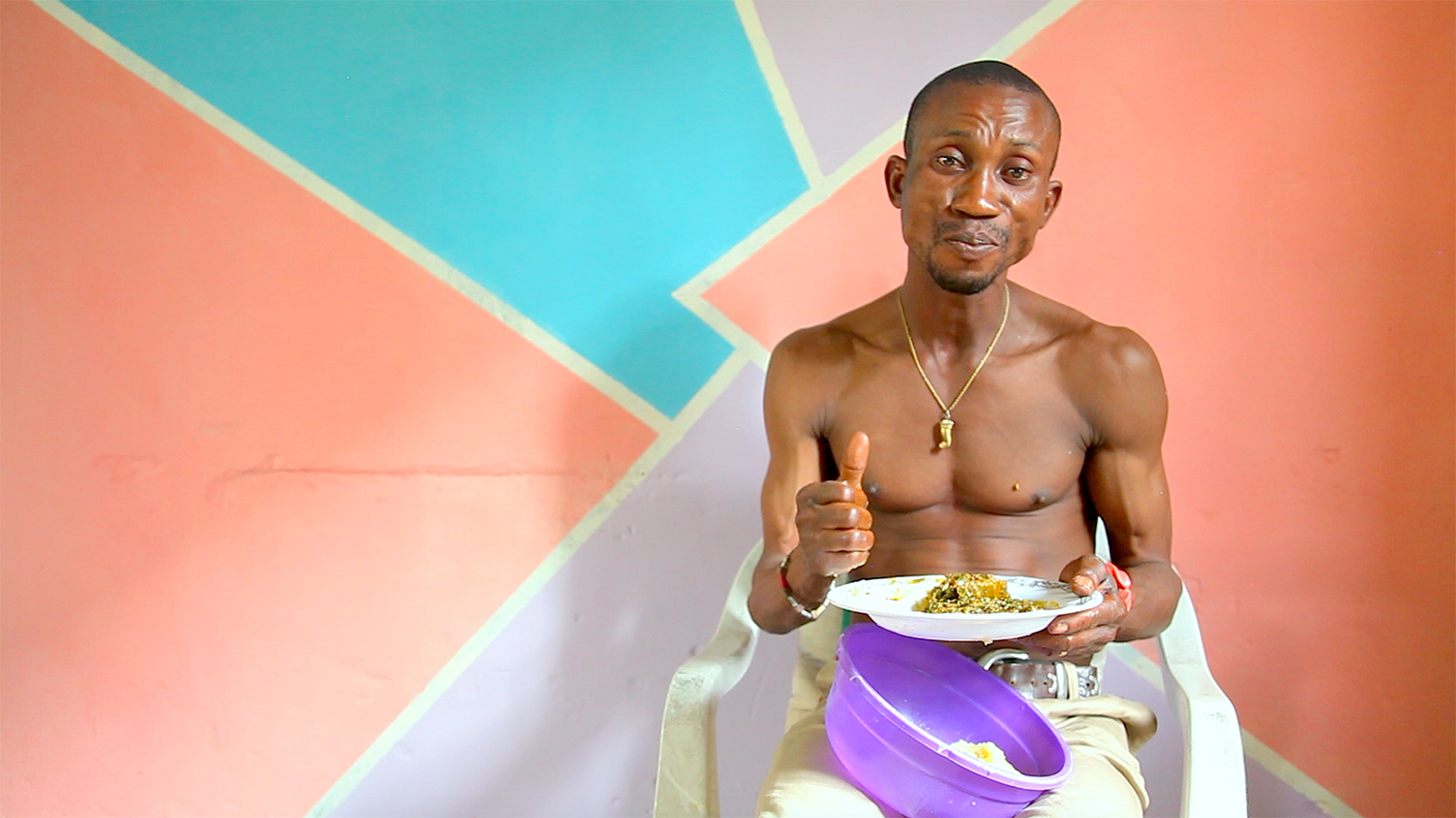 Zina-Saro-Wiwa-TABLE MANNERS Victor Eats Garri and Okro Soup with Goat Meat (video still)